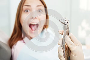 Scared woman at dentist's office