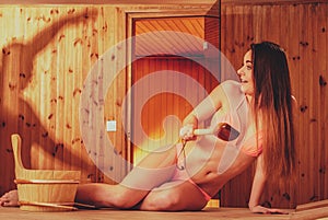 Scared woman in sauna. Spa wellbeing.