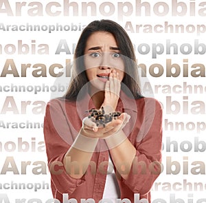 Scared woman with tarantula on background. Arachnophobia fear of spiders