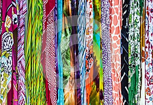 Scarfs silk headdresses, bright textile background