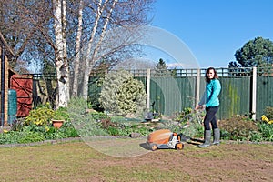 Scarifying a lawn damaged by chaffer grubs, in the Spring and Summer, of 2021, 2.