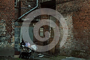 Scary back alley, poor dirty dark alley with trash