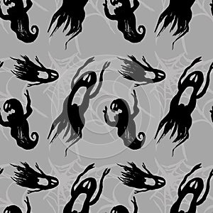 Scary black ghosts seamless pattern