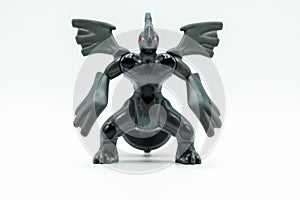 Scary black monster toy with wings and red eyes