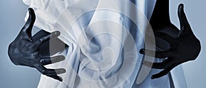 Scary blackhand on white background