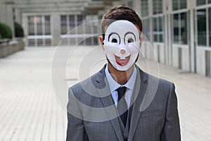Scary businessman wearing a mask