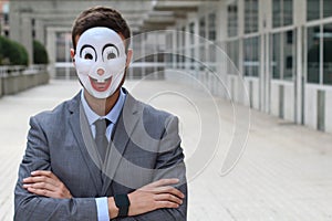 Scary businessman wearing a mask