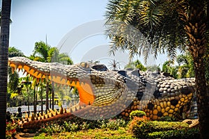 Scary Chalawan crocodile statue at Bueng Si Fai, the public park with lake at Muang district, Pichit province, Thailand. Chalawan