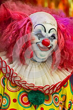 Scary clown doll face.