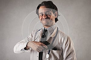 Scary doctor with a gun coming out of his pocket