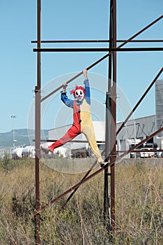 Scary evil clown outdoors