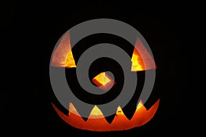 Scary ghost face glowing on Halloween