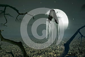 Scary ghost woman standing with night scene background