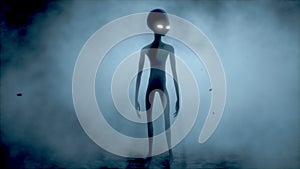 Scary gray alien walks and looks blinking on a dark smoky background. UFO futuristic concept. 3D rendering