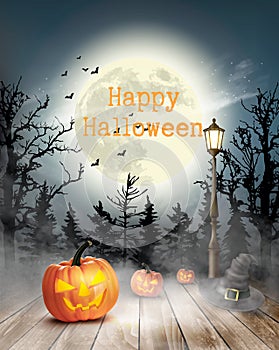 Scary Halloween background with pumpkins and moon.