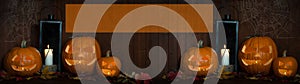 Scary Halloween celebration holiday party card background banner panorama - Many spooky carved glowing pumpkins, skull, spider web