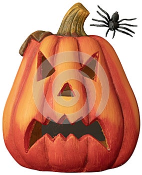 Scary Halloween pumpkin head and spider isolated on white.