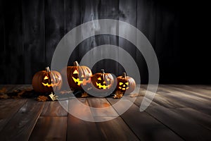 Scary Halloween pumpkins with evil eyes and faces on a wooden dark background