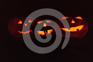 Scary Halloween pumpkins. Scary glowing faces trick or treat.