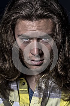 Scary Man with Long Hair and Evil Eyes