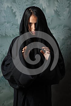 Scary nun in a cape