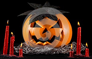 Scary pumpkin, jack lantern, pumpkin halloween, red candles on a black background, halloween theme, pumpkin killer