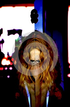 Scary redhead woman portrait, creepy reflection in mirror