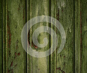 Scary scratched dark wooden background texture. Old mystic green