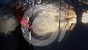 Scary witch summoning a spell