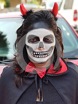 Scary woman made up like a skeleton with makeup