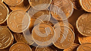 Scattered 20 Euro Cent Coins, Rotating Money Background