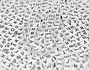 scattered cyrilic letters on white background