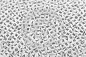 scattered cyrilic letters on white background