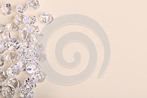 Scattered glass diamond chunks on a cream background