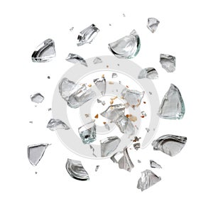 Scattered glass shards on a plain surface isolated on white background