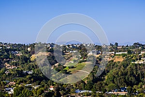 Scattered houses on one of the hills of Bel Air neighborhood, Los Angeles, California photo