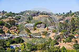 Scattered houses on one of the hills of Bel Air neighborhood, Los Angeles, California photo