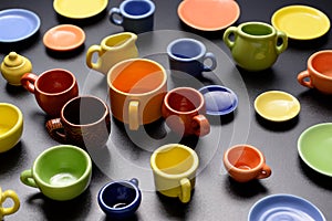 Scattered mugs and plates Different sizes and colors