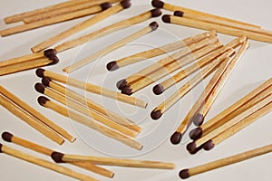 Scattered on the table matches.