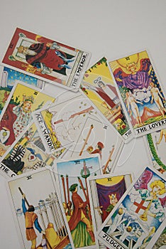 Tarot cards on the white surface. Vertical image.