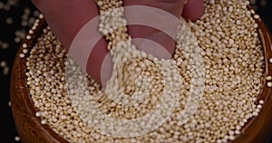 scattered white quinoa seeds, close up