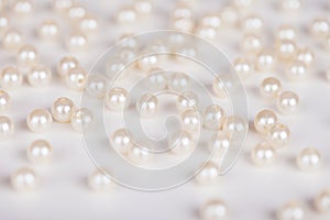 Scattering of fake pearls photo