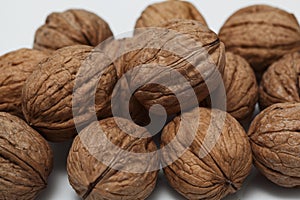 A scattering of walnuts in close-up