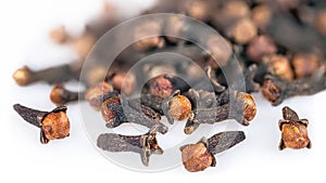 Pile of aromatic dried cloves in close-up. Syzygium aromaticum photo