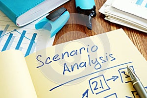 Scenario Analysis with graphs and stack of paper photo