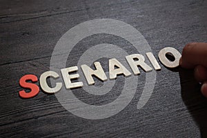 Scenario, text words typography written with wooden letter on black background, life and business motivational inspirational