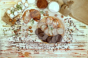 Scene with an assortment of pastries, original Nuremberg gingerbread cookies, rolls, croissants with ingredients. Top view