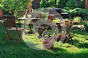 Scene Of Barbecue Grill Party On Lawn In The Backyard