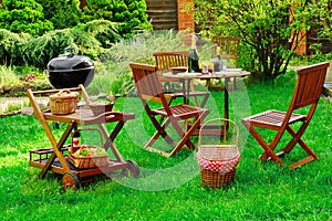 Scene Of Barbecue Grill Party On Lawn In The Backyard