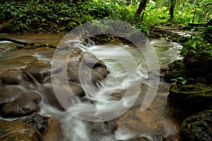 Scene of beautiful waterfall in forest park